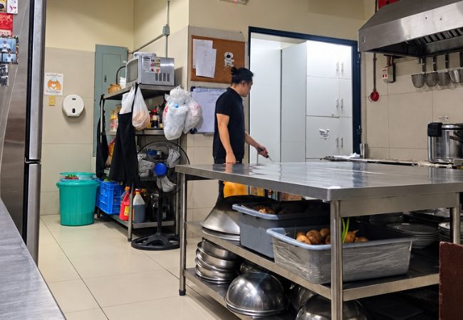 Technician inspecting a service area